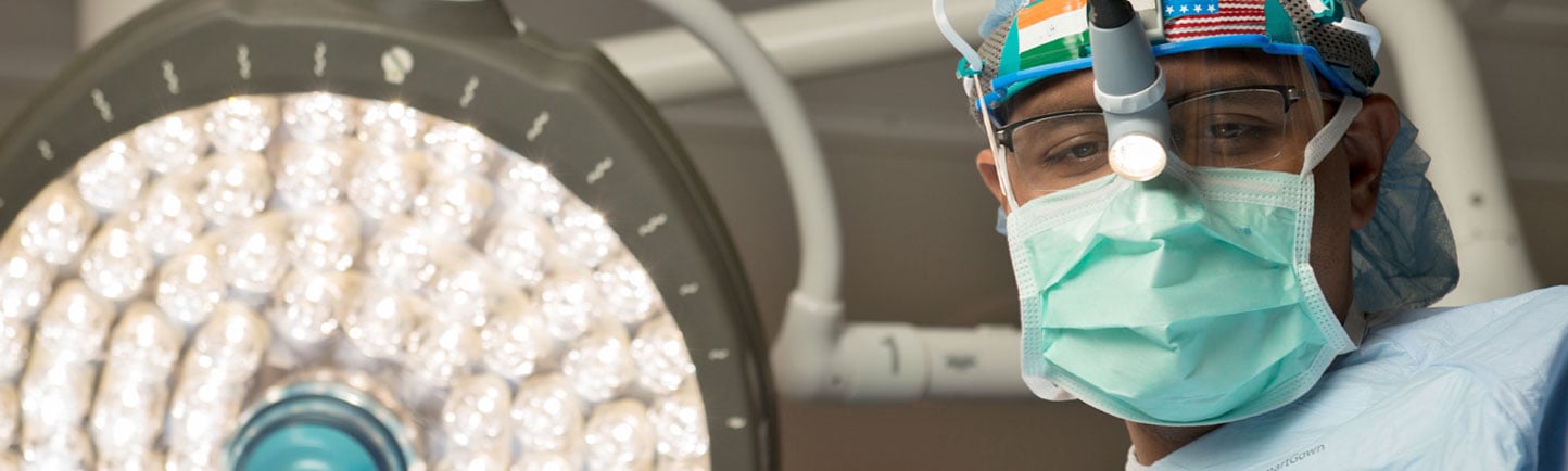 Kiran Turaga, MD, MPH, close-up in surgery