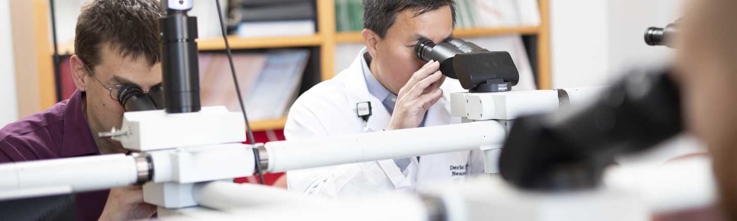 Pathologist Peter Pytel, MD, and neuro-oncologist Deric Park, MD