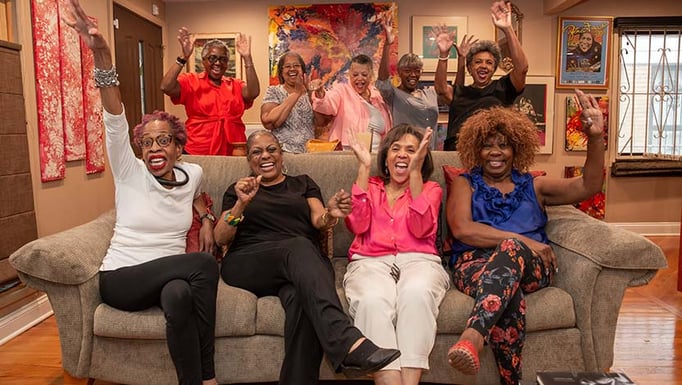 Breast cancer survivor Kathleen Humphries, front row, second from left, celebrates with her friends who helped her during her treatment.