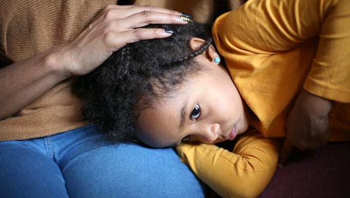 A child with stomach discomfort