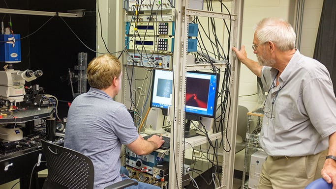 Andrew Tryba and Wim van Drongelen in the epilepsy lab