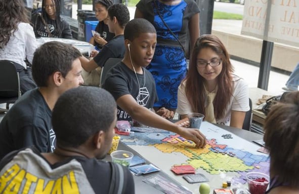 Children playing a board game together