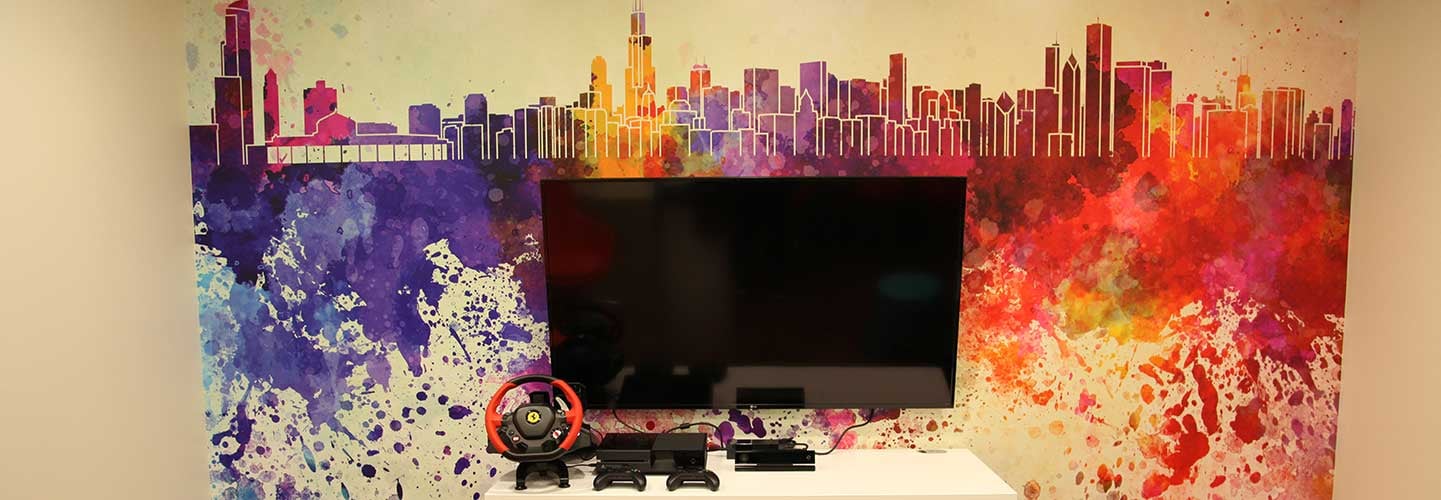 Artwork in patient lounge for teens with cancer at Comer Children
