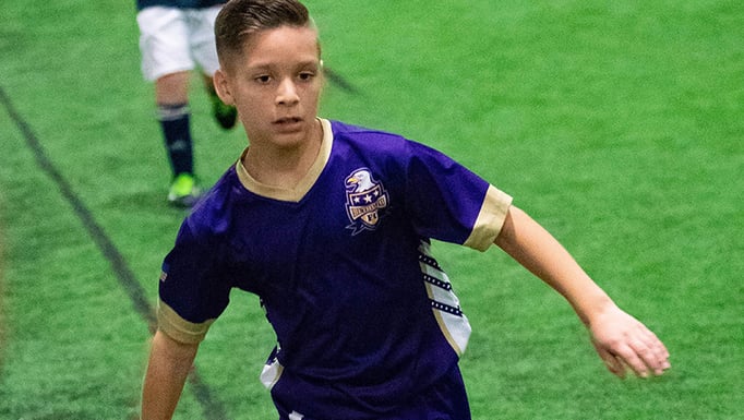 Luke Clouser playing soccer