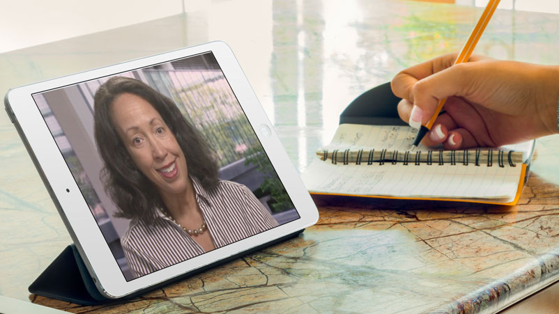 Catherine Harth, MD, on iPad screen doing video visit