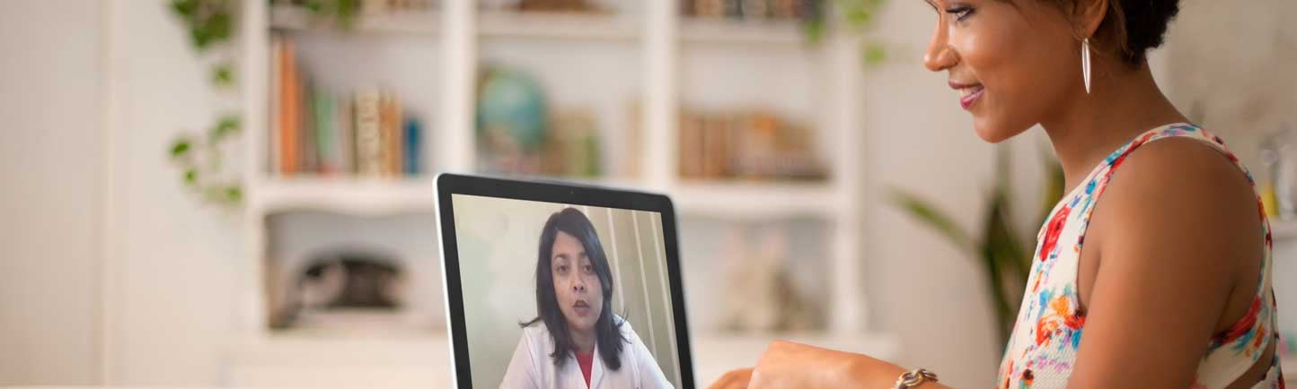 Nita Lee, MD, doing telehealth visit with a patient