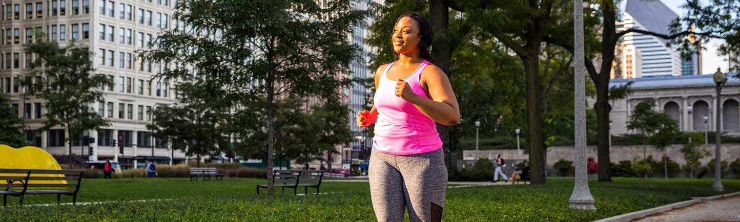 Young african american women running in downtown Chicago