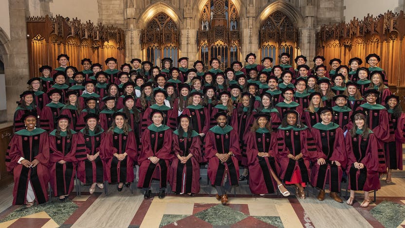 The Pritzker School of Medicine Class of 2024 poses for a group photo following their hooding ceremony May 24, 2024.