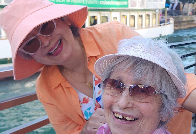 Elvira Carrizales and her mother Julie on a boat 