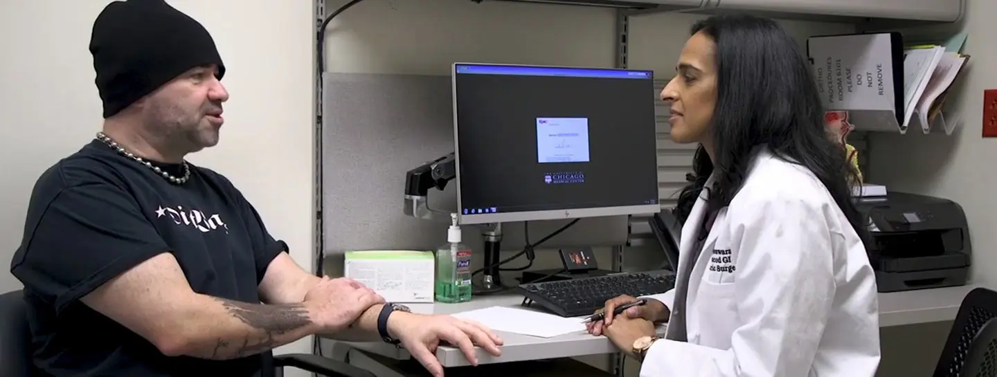 Dr. Vigneswaran with an anti-reflux surgery patient