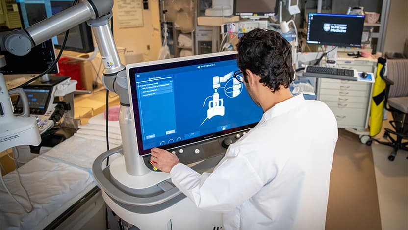 Interventional radiologist reviews a scan