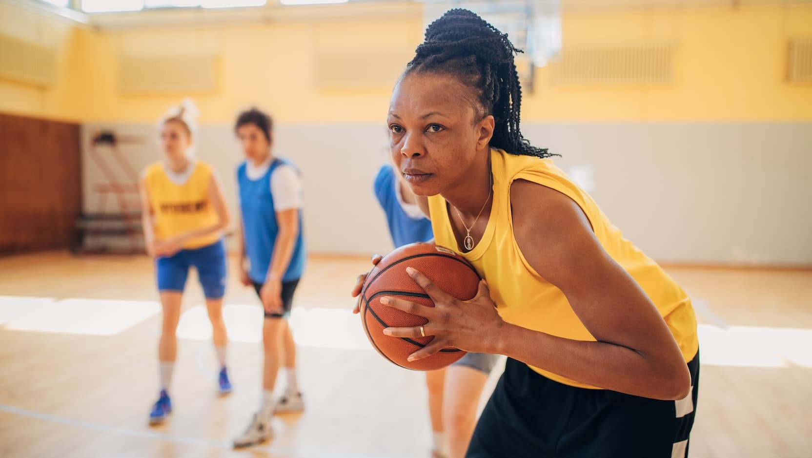 women playing basketball