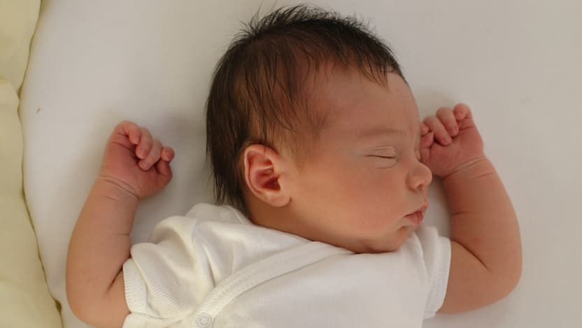 Infant sleeping on back