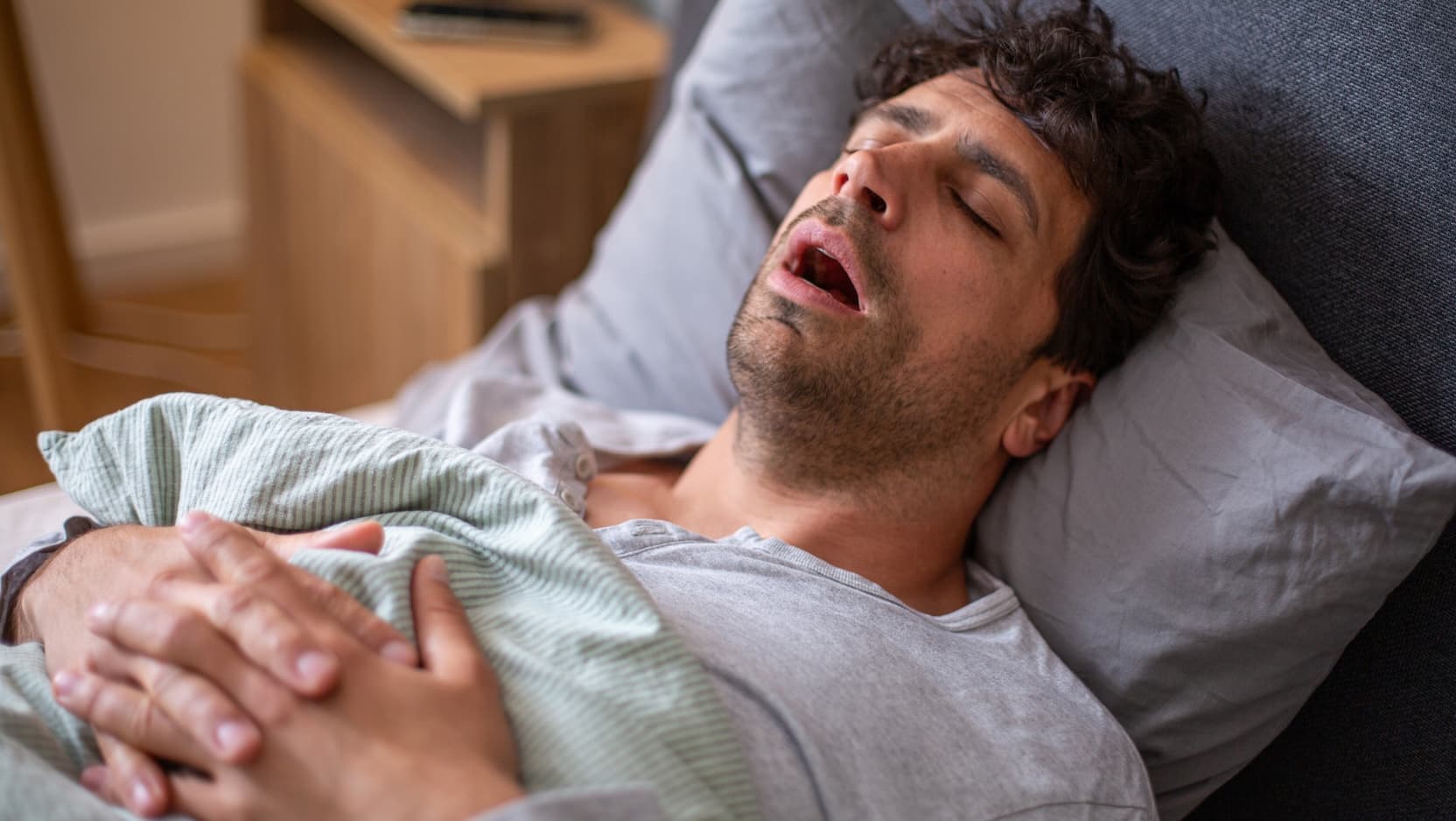 man sleeping with his mouth open