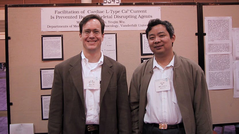 Mark Anderson, MD, PhD, with Yuejin Wu, presenting research