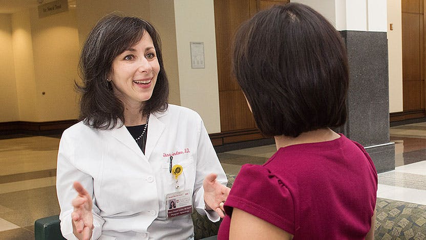 Dr. Stacy Tessler Lindau speaking with a patient