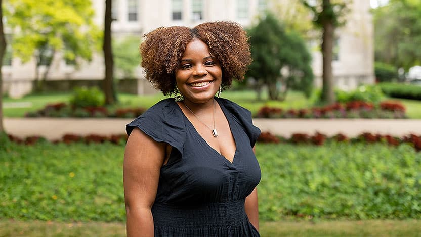 Portrait of Taiylar Ball in a courtyard