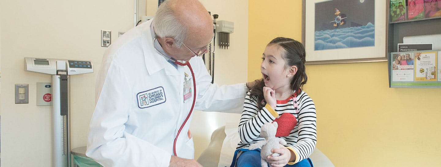 Pediatric gastroenterologist and celiac disease specialist Stefano Guandalini, MD, with a patient