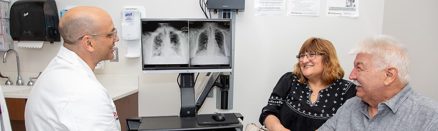 Nurse with a lung transplant patient
