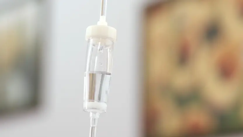 Intravenous drip with a drop of medicine close-up