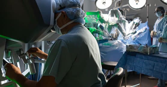 surgeon at robotic surgery console