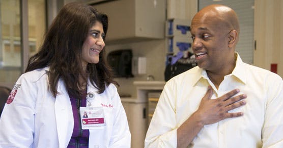 Medical oncologist Sonali Smith, MD, with lymphoma patient, Clayton Harris