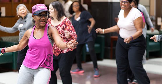 Image of participants going through a Zumba workout