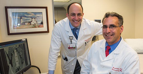  Dr. David Rubin, left, and Dr. Russell Cohen in their clinic at DCAM