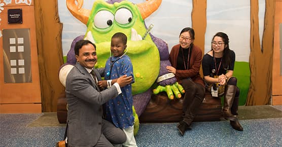 Dr. Gundeti with patient