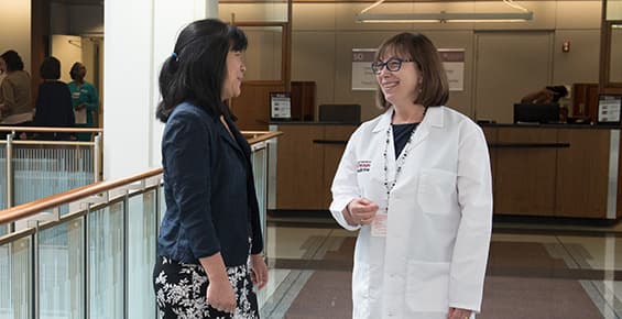 Michelle Josephson, MD, kidney transplant specialist with a patient