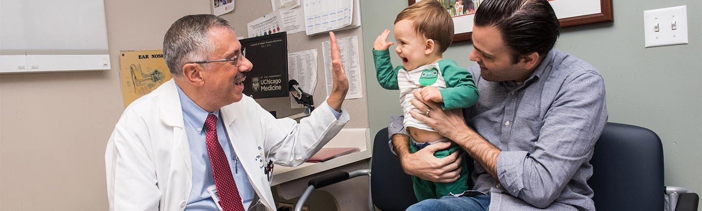 Dr. Baroody with ENT patient and father