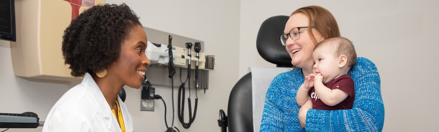 UChicago Medicine physician with adult and infant