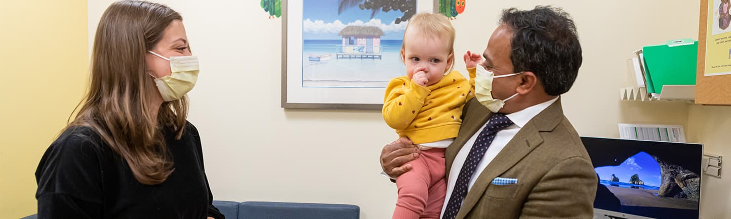 Pediatric urologists Dr. Gundeti working with pediatric patient